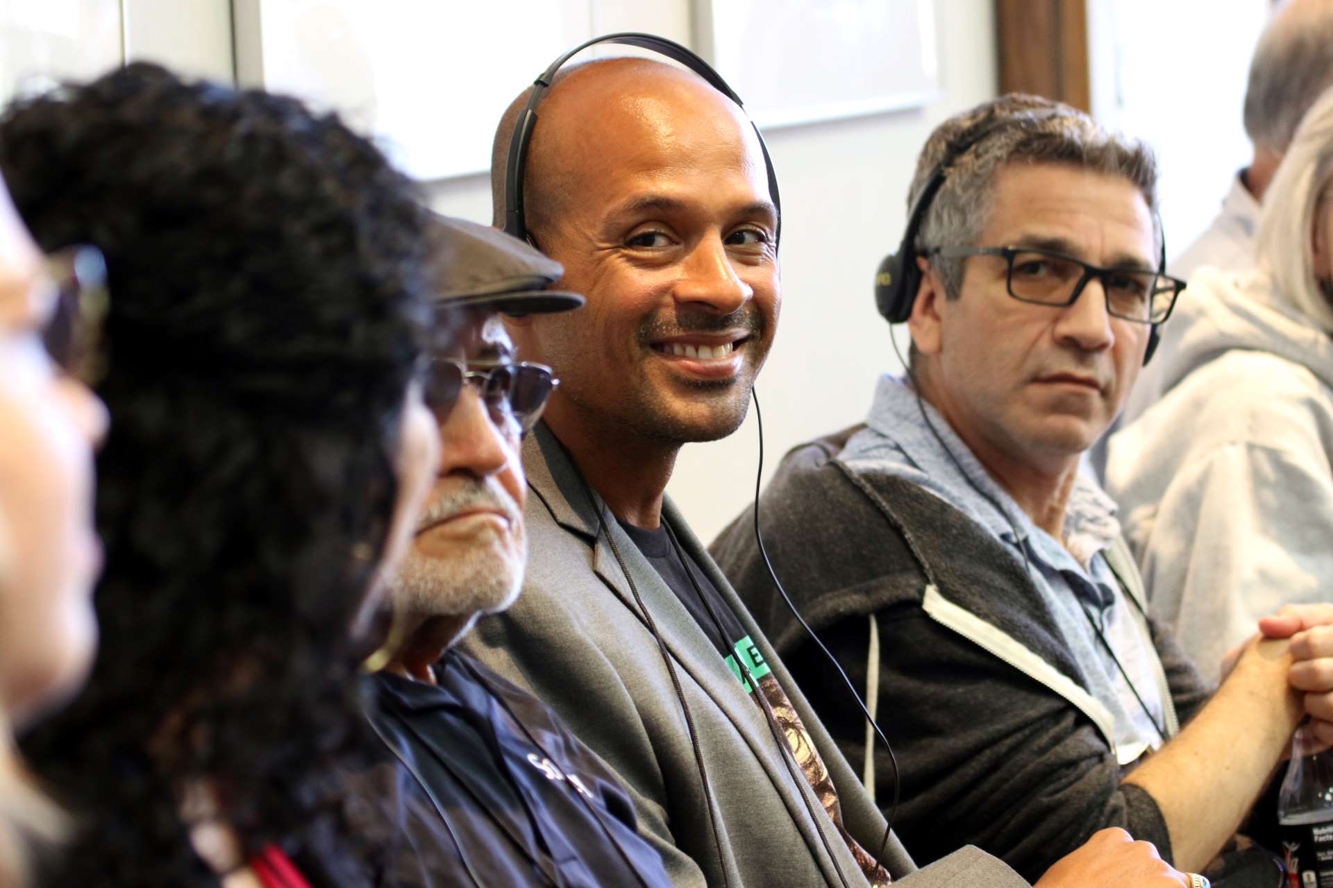 CRLA board and staff members wearing interpreting headsets