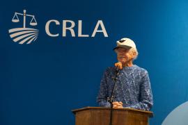 Maurice "Mo" Jourdane speaking at CRLA's 50th anniversary celebration of the El Cortito victory