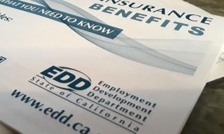 close-up image of unemployment insurance materials from California EDD